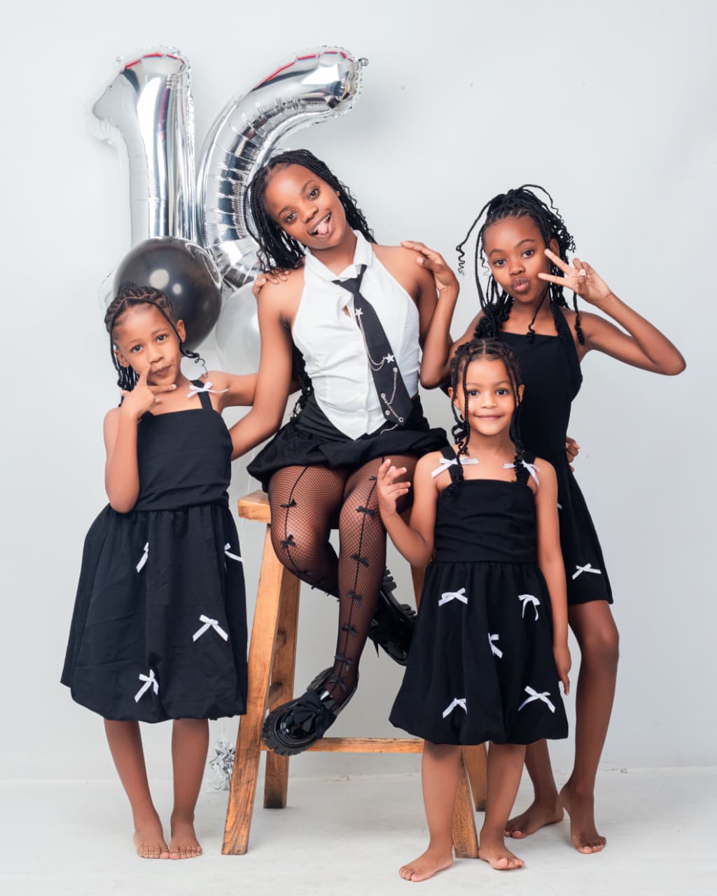 Sweet sixteen shoot with four siblings in black